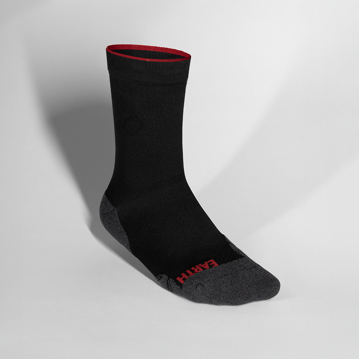 Black Near Earth Distance running sock with breathable zones and cushioning.